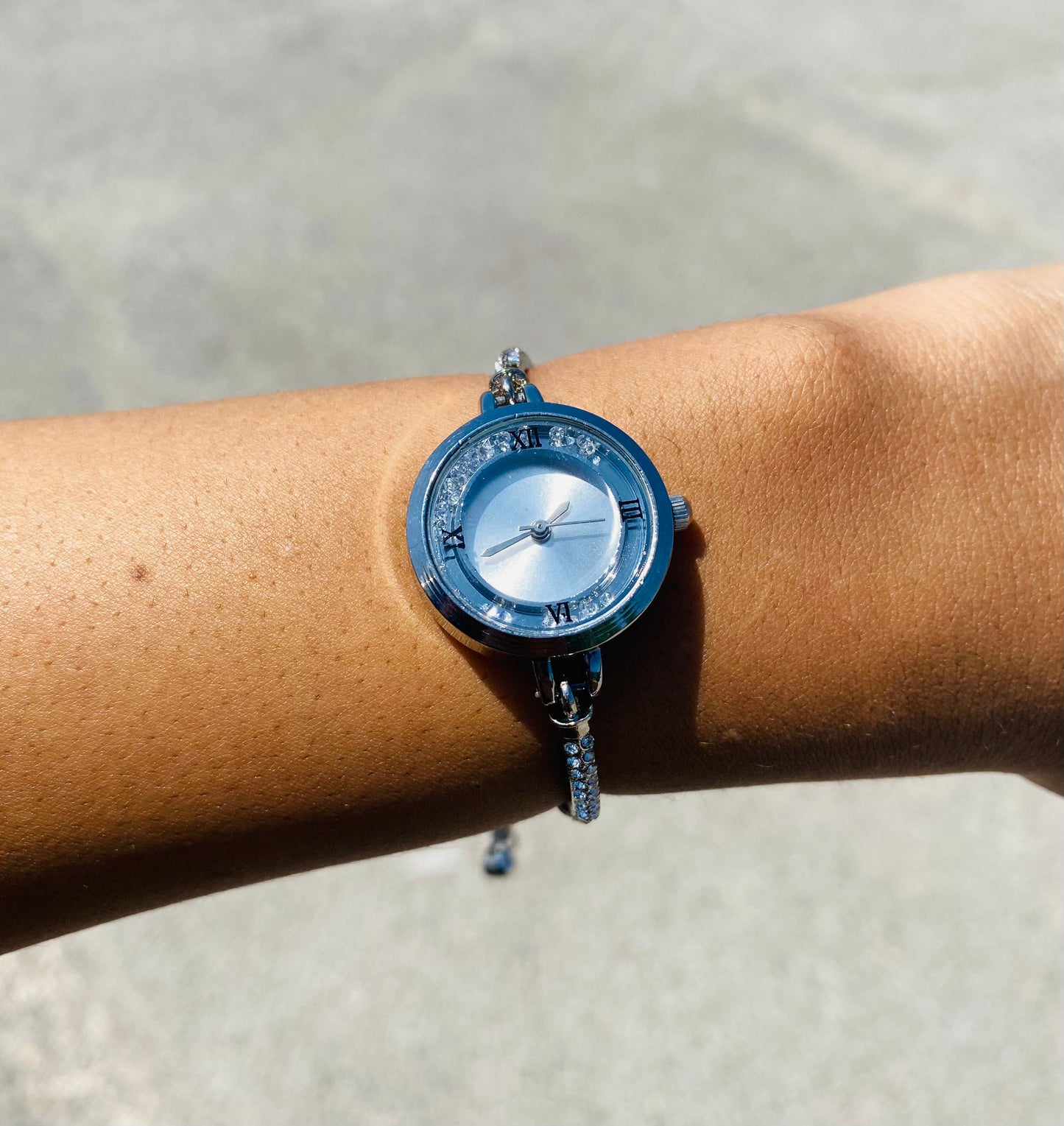 Silver drawstring watch